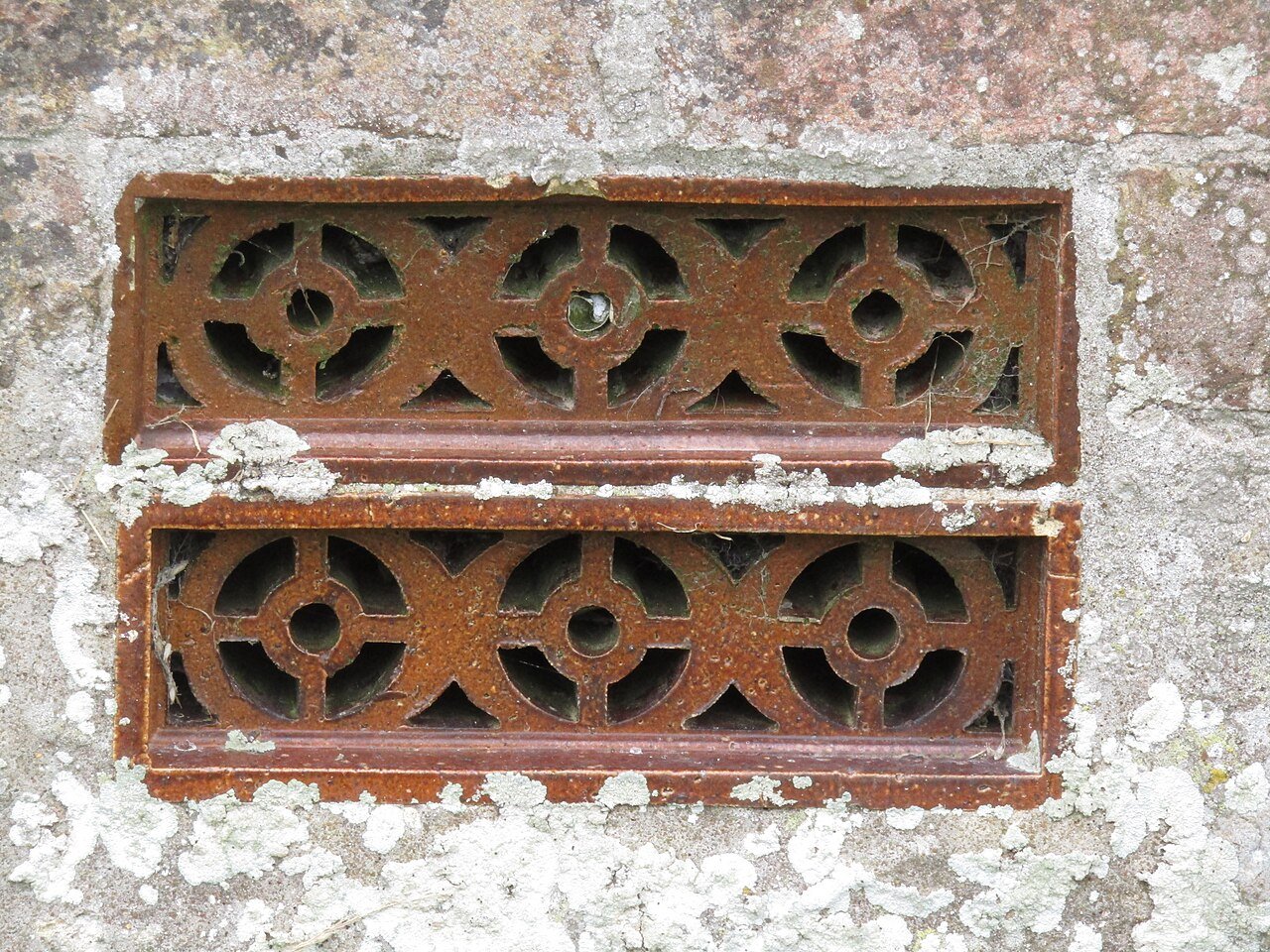 Ventilation openings in a masonry foundation wall