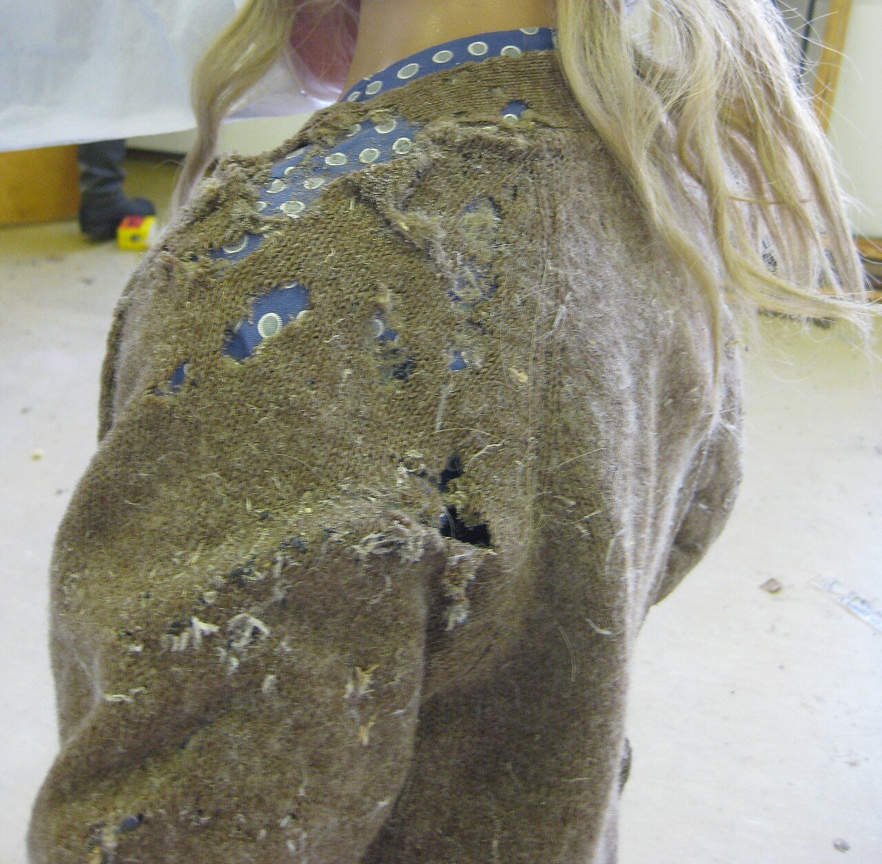 Moth-eaten wool cardigan