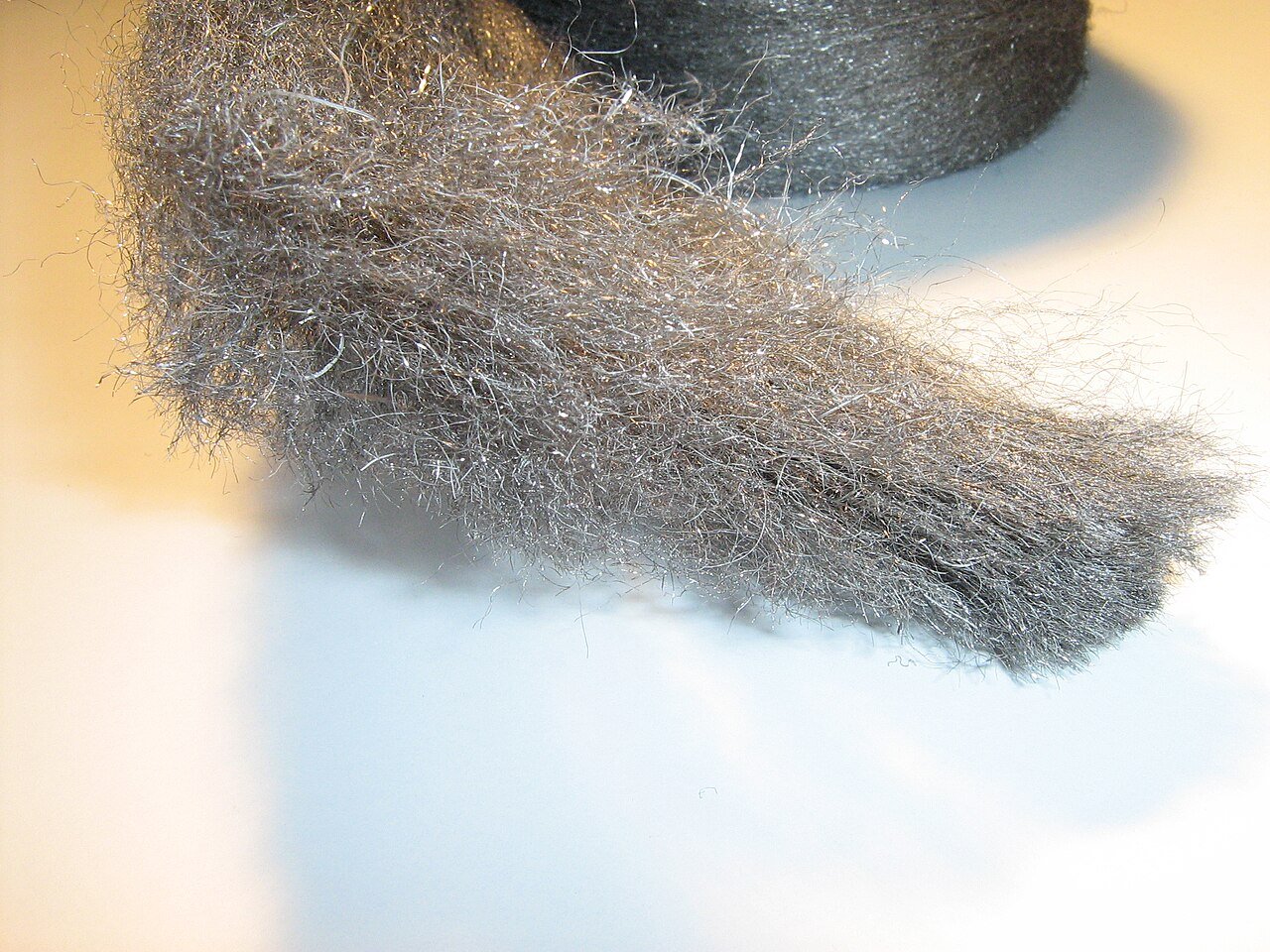 Coarse grade steel wool for blocking mouse entry gaps
